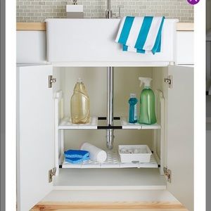 Under sink shelf organizer, adjustable. New in box. I have 2.